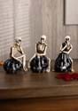 Set of 3 Resin Skeletons Sitting on LED Jack O Lanterns